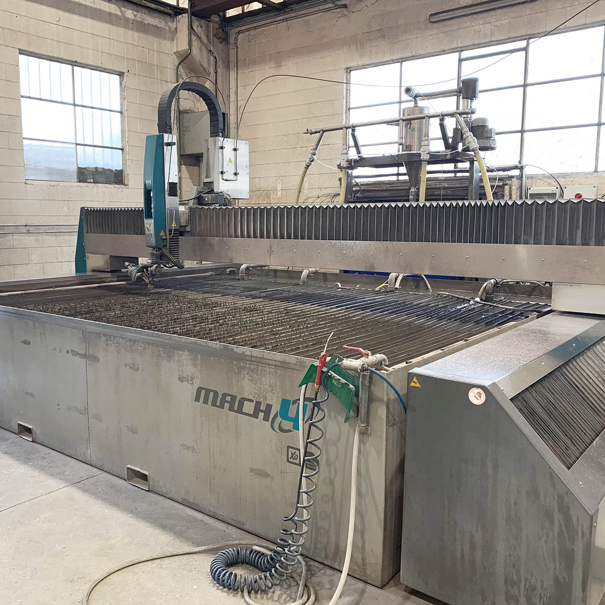 Mauri Giacobbe lavorazione meccanica tramite taglio ad acqua 5 assi Mauri Giacobbe lavorazione meccanica tramite taglio ad acqua 5 assi